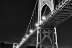 A black and white night photo of St. John's Bridge in Portland, Oregon