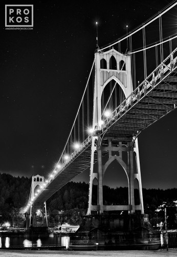A black and white night photo of St. John's Bridge in Portland, Oregon