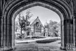 A black and white fine art photo of Alexander Hall framed in the arch of Blair Hall on the campus of Princeton University, New Jersey