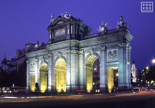 A view of the Puerta de Alcala at night, Madrid, Spain. Framed fine art prints of this photo are available in various sizes.