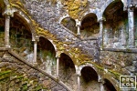 The Poço Iniciático, a hidden well with arched spiral stairway in the Quinta da Regaleira gardens of Sintra, Portugal. Limited edition fine art prints of this photo are available framed in various styles. 