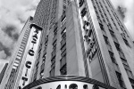 A fine art architectural photograph of the facade of Radio City Music Hall in black and white, New York City. Fine art prints of this photo are available up to 60 inches and framed in various wood, metal, and acrylic styles.