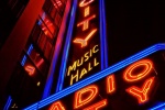 Neon signs of Radio City Music Hall at night, New York City