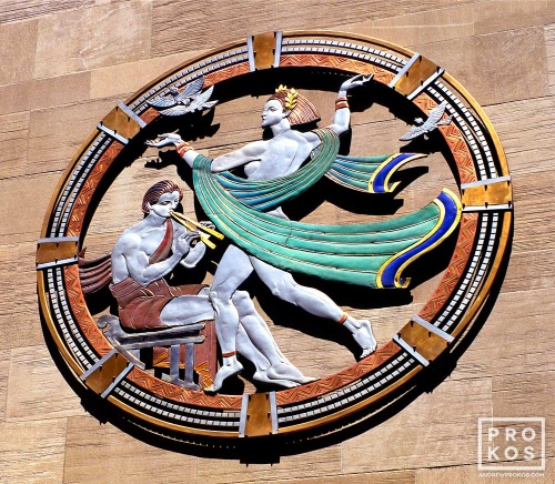 An art deco rondel representing Song on the facade of Radio City Music Hall, New York City
