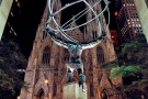 A view of Rockefeller Center's Atlas statue and St. Patrick's Cathedral at night