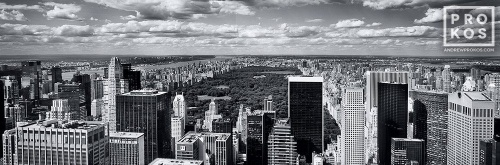 A black and white panoramic photo of Midtown Manhattan skyline and Central Park from Rockefeller Center