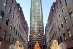 A photo of Rockefeller Center at Christmas with lighted angel decorations, New York City