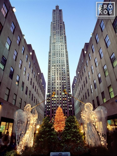 A photo of Rockefeller Center at Christmas with lighted angel decorations, New York City