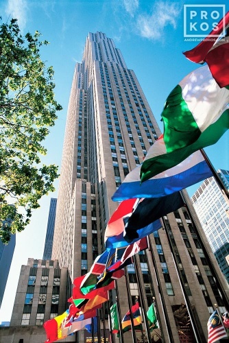 A daytime view of Rockefeller Center with flags of the world, New York City