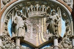 A close-up architectural detail with a shield and winged angels from Antoni Gaudi's Sant Pau Hospital, Barcelona, Spain. Fine art prints of this photo are available framed in various styles, please inquire. 