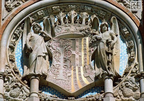 A close-up architectural detail with a shield and winged angels from Antoni Gaudi's Sant Pau Hospital, Barcelona, Spain. Fine art prints of this photo are available framed in various styles, please inquire. 