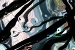 An abstract fine art photo of reflections on a polished metal interior from the series "Audacity of Color"