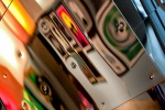 An abstract fine art photo of colorful reflections on a polished metal surface from the series "Audacity of Color"