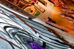 An abstract fine art photo of colorful reflections from a polished metal surface from the series "Audacity of Color"