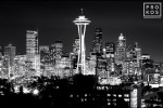 A photograph of the Seattle, Washington skyline at night in black and white