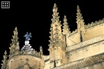 A view of the Gothic spires of Segovia Cathedral at night, Spain. Fine art prints of this photo are available framed in various sizes. 