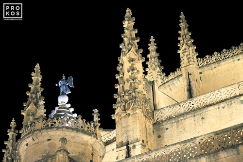 A view of the Gothic spires of Segovia Cathedral at night, Spain. Fine art prints of this photo are available framed in various sizes. 