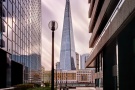 A color photograph of The Shard skyscraper in London, United Kingdom captured in a four minute long exposure by photographer Andrew Prokos