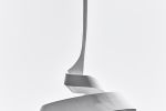 A black and white fine art photograph of the spiral monument entitled "The Scroll" at Sharjah's House of Wisdom, United Arab Emirates. Large-scale fine art prints of this photo are available up to 72 inches and framed in wood, metal, and acrylic styles.