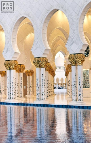 A view of the ornate colonnade at the Sheikh Zayed Grand Mosque in Abu Dhabi, United Arab Emirates