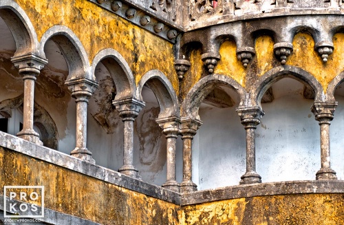 A fine art architectural photo of a neo-gothic colonnade from the Palacio da Pena in Sintra, Portugal