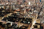 An ultra-high-definition panoramic photo of the rooftops of SoHo, New York City transitioning from day to night, from Andrew's 'Night & Day' series.