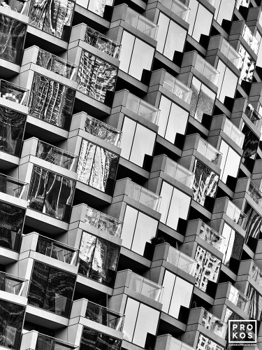A black and white architectural photo of the windows from spiral contemporary architecture. Fine art prints of this photo are available up to 72 inches in height and framed in wood, metal, and acrylic styles. 