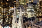 A view of St. Patrick's Cathedral and the skyscrapers of Midtown Manhattan at Night