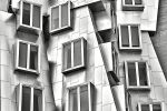 A black and white architectural photograph of the Stata Center at the Massachusetts Institute of Technology by photographer Andrew Prokos