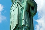 A panoramic fine art photo of the Statue of Liberty during the day, New York City.