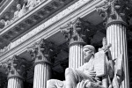 A black and white fine art architectural photo of the U.S. Supreme Court with Guardian of Law statue in the foreground, Washington DC