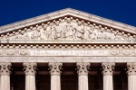 A panoramic architectural photo of the United States Supreme Court building's West Pediment, Washington DC