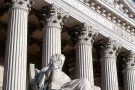 A color architectural photo of the United States Supreme Court building with the female 'Contemplation of Justice' statue, Washington DC. Fine art prints of this photo are available framed in various styles. 