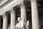 A color architectural photo of the United States Supreme Court with the male 'Guardian of Law' statue, Washington DC. Fine art prints of this photo are available framed in various styles. 