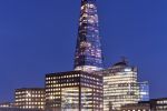 A view of the Shard and London Bridge at dusk by photographer Andrew Prokos. High-definition fine art prints of this color photo are available up to 80 inches in height.