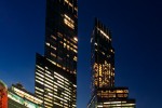 A view of Deutsche Bank Center (formerly Time Warner Center) from Columbus Circle at night, New York City by architectural and fine art photographer Andrew Prokos