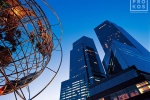 A view of Deutsche Bank Center (formerly Time Warner Center) as seen from Columbus Circle at dusk, New York City by architectural and fine art photographer Andrew Prokos
