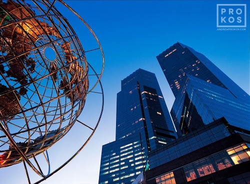 A view of Deutsche Bank Center (formerly Time Warner Center) as seen from Columbus Circle at dusk, New York City by architectural and fine art photographer Andrew Prokos