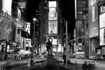 An ultra high-definition panoramic view of Times Square at night in black and white, New York City. Large-scale fine art prints of this photo are available up to 120 inches wide.