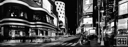 An ultra high-definition panoramic view of Times Square at night in black and white, New York City. Large-scale fine art prints of this photo are available up to 120 inches in width.
