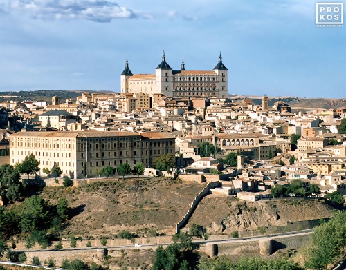 A view of the Alcazar of Toledo, Spain and the city as seen from afar. Framed fine art prints of this photo are available in various sizes, please inquire. 