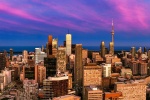 A panoramic cityscape photograph of Toronto, Canada at dusk. Framed fine art prints of this photo are available in sizes up to 120 inches wide.