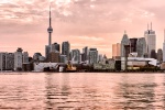 A panoramic view of the skyline of Toronto, Canada as seen at sunset. Large-scale fine art prints of this photo are available in sizes up to 120 inches wide and framed in various wood, metal and acrylic styles.