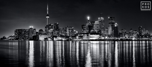 A black and white view of the skyline of Toronto, Canada as seen at night. Large-scale fine art prints of this photo are available in sizes up to 120 inches wide and framed in various wood, metal and acrylic styles.