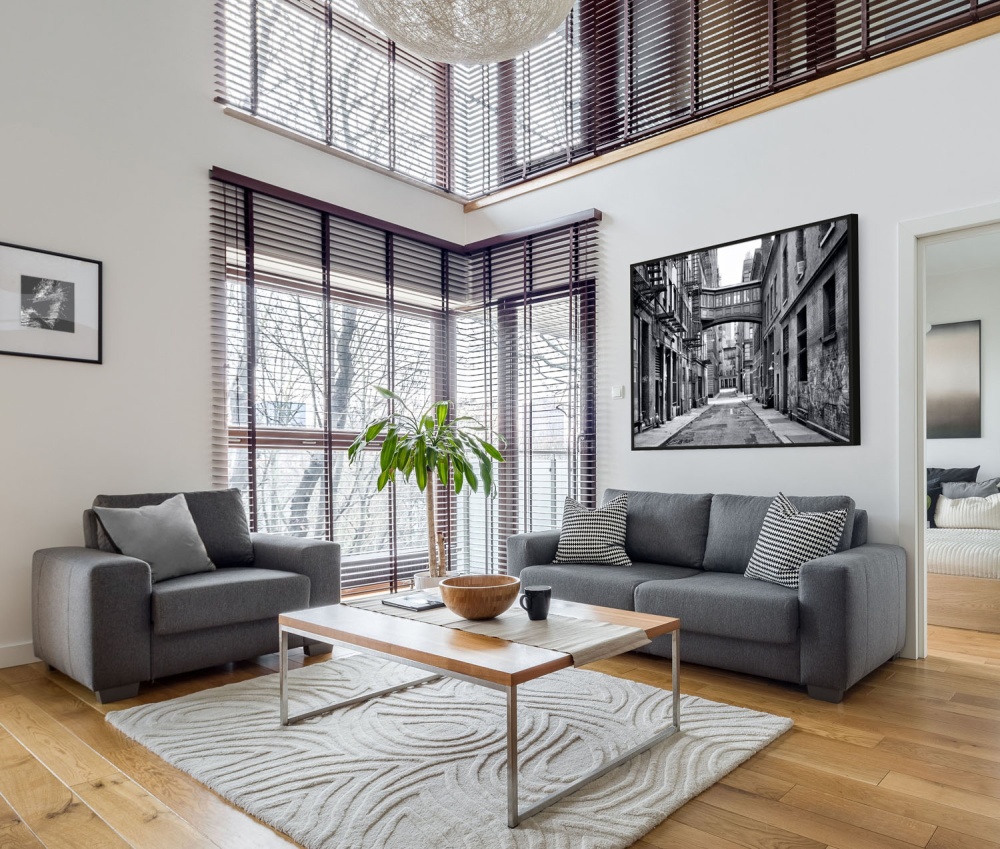 A framed black and white photograph of Staple Street, Tribeca NYC by photographer Andrew Prokos as seen in a residence.