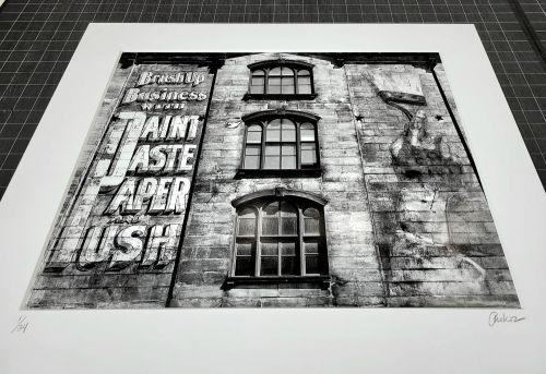 A matted black and white print of 'Tribeca Street Mural' by photographer Andrew Prokos