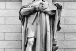 Black and white fine art photograph of the statue of Archimedes from the facade of Union Station in Washington DC