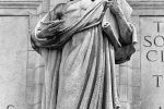 Black and white fine art photograph of the statue of Apollo (depicting inspiration) from the facade of Union Station in Washington DC