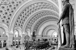 A black and white fine art architectural photo of the sweeping interior of Union Station's Main Hall in Washington DC