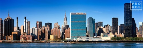 A panoramic skyline of Midtown Manhattan, the Chrysler Building, and the United Nations buildings as seen from Queens, New York City. High-definition fine art prints of this photo are available up to 120 inches wide. 